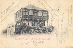 dobová pohlednice s motivem hostince na zbytcích kaple