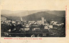 dobová pohlednice vsi s kostelem po požáru