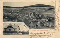 dobová pohlednice vsi s kostelem (vlevo)