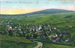 dobová pohlednice vsi s kostelem (vpravo)