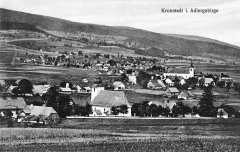 dobová pohlednice vsi s kostelem