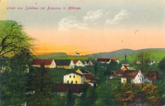 dobová pohlednice vsi s kostelem