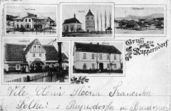 dobová pohlednice vsi s kostelem