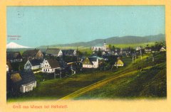 dobová pohlednice vsi s kostelem