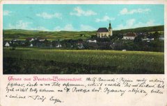 dobová pohlednice vsi s kostelem