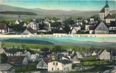 dobová pohlednice vsi s kostelem