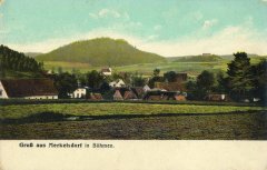 dobová pohlednice vsi s kostelem