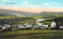 dobová pohlednice města s kostelem