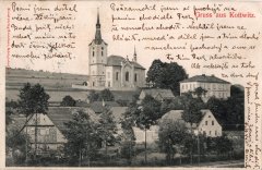 dobová pohlednice vsi s kostelem