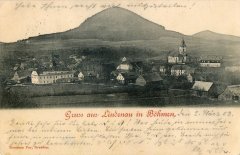 dobová pohlednice vsi s kostelem