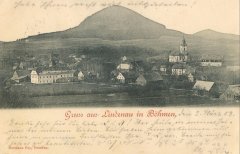 dobová pohlednice vsi s kostelem