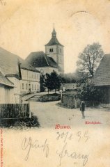 dobová pohlednice vsi s kostelem