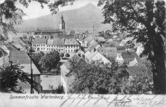 dobová pohlednice města s kostelem