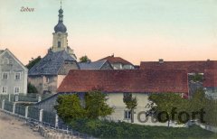 dobová pohlednice vsi s kostelem