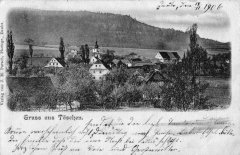 dobová pohlednice vsi s kostelem