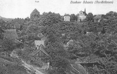 dobová pohlednice vsi s kostelem