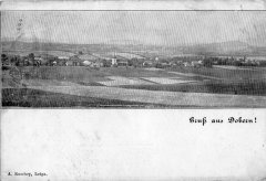 dobová pohlednice vsi s kostelem