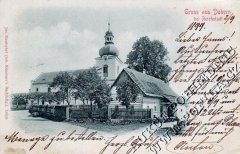 dobová pohlednice vsi s kostelem