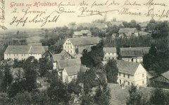 dobová pohlednice vsi s kostelem