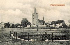 dobová pohlednice vsi s kostelem