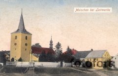dobová pohlednice vsi s kostelem