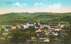 dobová pohlednice vsi s kostelem