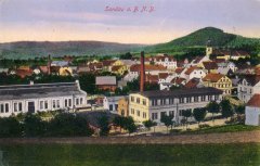 dobová pohlednice města s kostelem