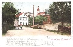 dobová pohlednice vsi s kostelem