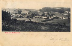 dobová pohlednice vsi s kostelem