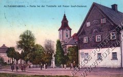 dobová pohlednice vsi s kostelem