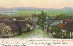 dobová pohlednice vsi s kostelem