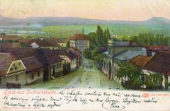dobová pohlednice vsi s kostelem