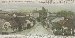 dobová pohlednice vsi s kostelem