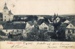 dobová pohlednice vsi s kostelem