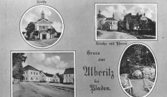 dobová pohlednice vsi s kostelem