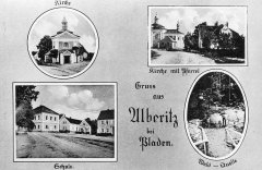 dobová pohlednice vsi s kostelem