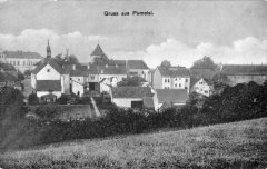 dobová pohlednice městyse s kostelem