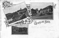 dobová pohlednice vsi s kostelem