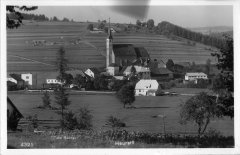 dobová pohlednice vsi s kostelem