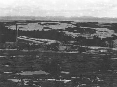 dobová pohlednice vsi s kostelem