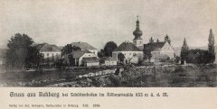 dobová pohlednice vsi s kostelem