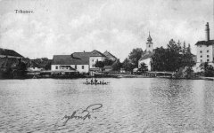 dobová pohlednice vsi s kostelem