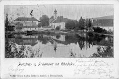 dobová pohlednice vsi s kostelem