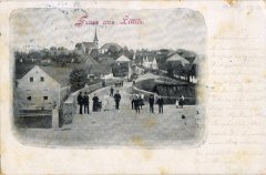 dobová pohlednice vsi s kostelem