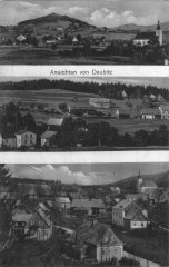 dobová pohlednice vsi s kostelem