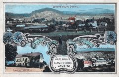 dobová pohlednice vsi s kostelem