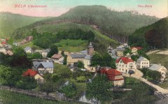 dobová pohlednice vsi s kostelem