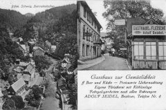 dobová pohlednice vsi s kostelem