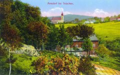 dobová pohlednice vsi s kostelem