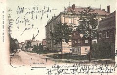 dobová pohlednice městyse s kostelem (v pozadí)